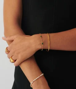 Magma Gemstone Charm Bracelet In Gold