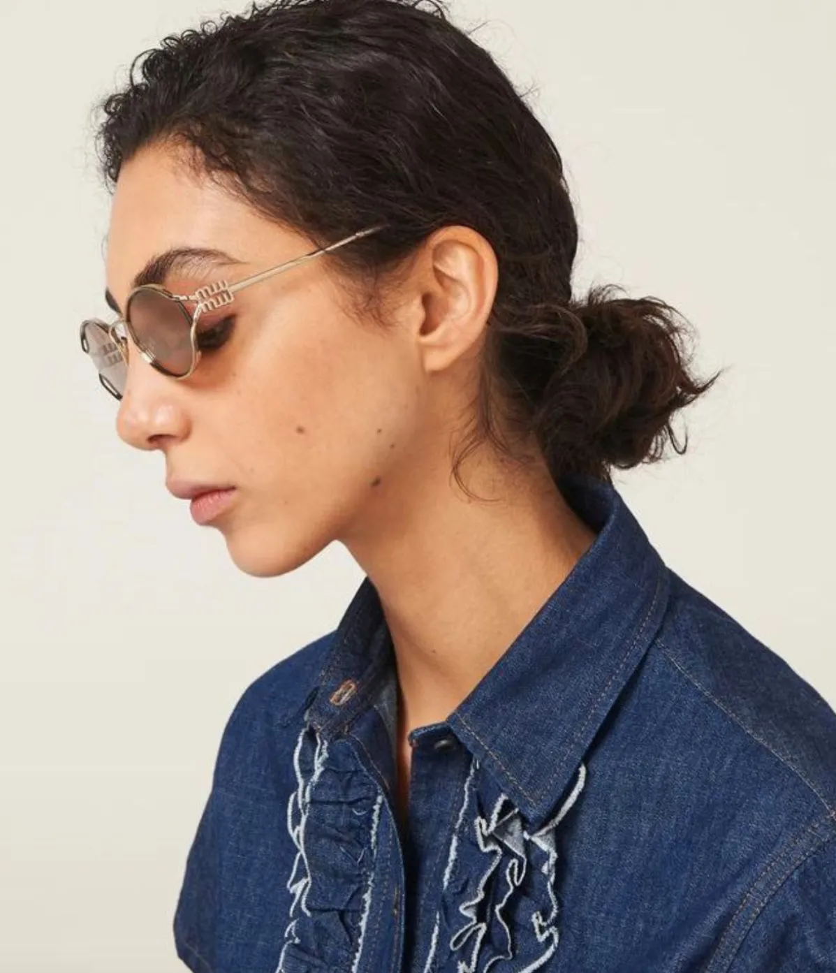 Miu Miu Oval Sunglasses In Pale Gold